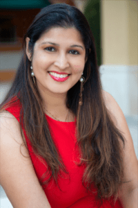 smiling woman in red dress