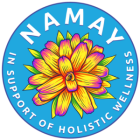 NAMAY is written above a bromeliad plant in yellow, purple and reds, with the tagline, "In support of holistic wellness" encircled below.
